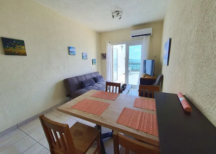 Апартаменты Poseidon 51 - Beachfront Two Bedroom Пафос